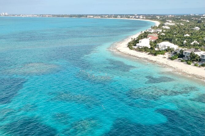 1 Hour Private Parasailing Charter, Grace Bay, Providenciales - Music, photos, and the extras