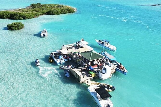 FAMOUS SHIPWRECK, Tiki Bar & Iguana Island Private Jet Ski Tour - La Famille Express and the 25-foot jump