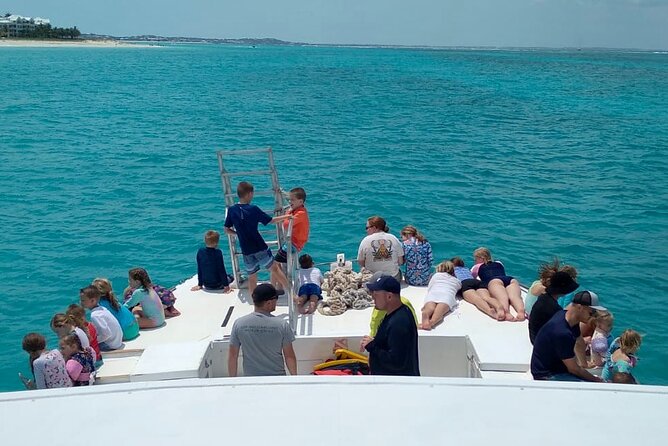 Group Reef, Beach and Sandbar Tour from Providenciales - Leaving Grace Bay by catamaran