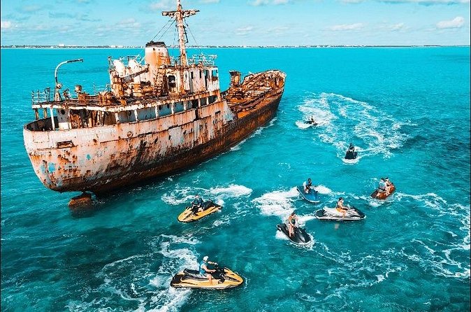 Jet Skiing around La famille ship and smaller pristine cays - Sandbars, Noah’s Ark, and swimming time