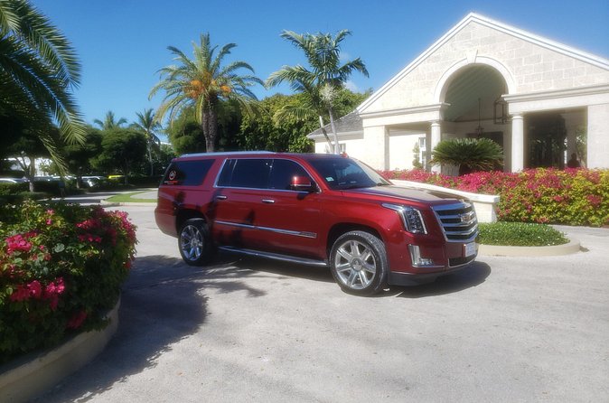Private Transportation Services (Luxury SUV: Departures) - The pickup outside your hotel or villa