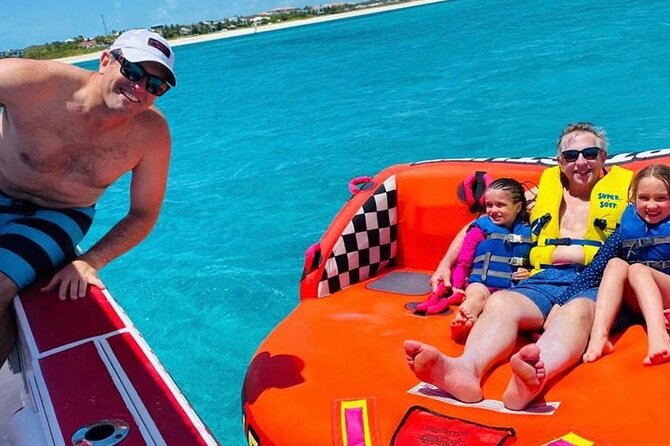 Tubing on grace bay beach Turks and caicos islands - The crew, from Noelle to Captain Jason