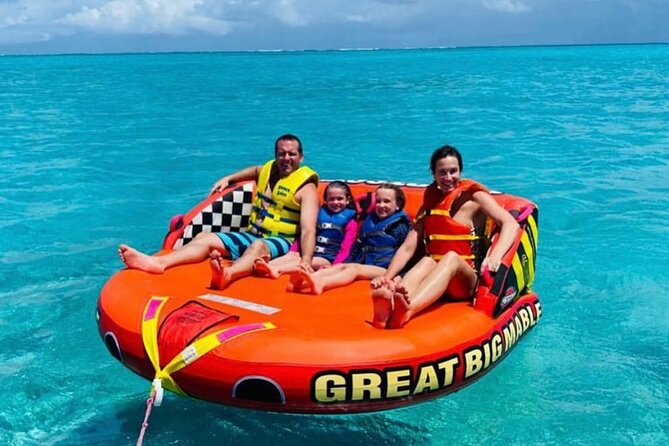 Tubing on grace bay beach Turks and caicos islands - Who will get the most from this experience